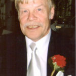 Juha Nuora (1938–2016) Dir.mus., opettaja, kapellimestari, kuoronjohtaja